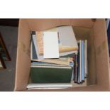 Box containing various books