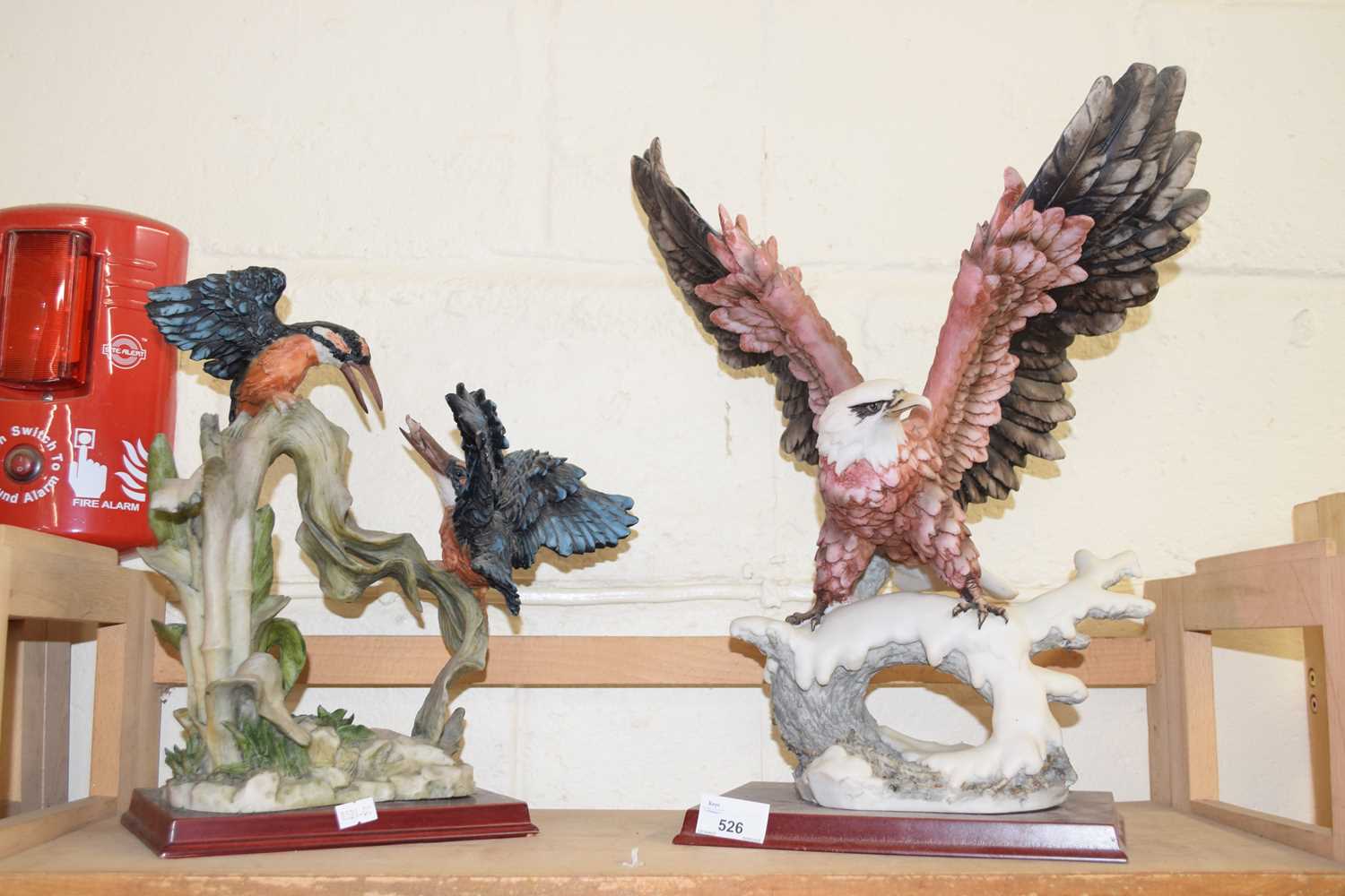 Two large modern bird figures