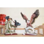 Two large modern bird figures