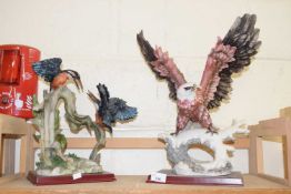 Two large modern bird figures