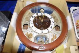 Box containing a large Seiko modern wall clock