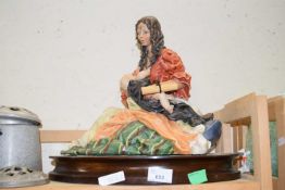 Large figure of a woman and child
