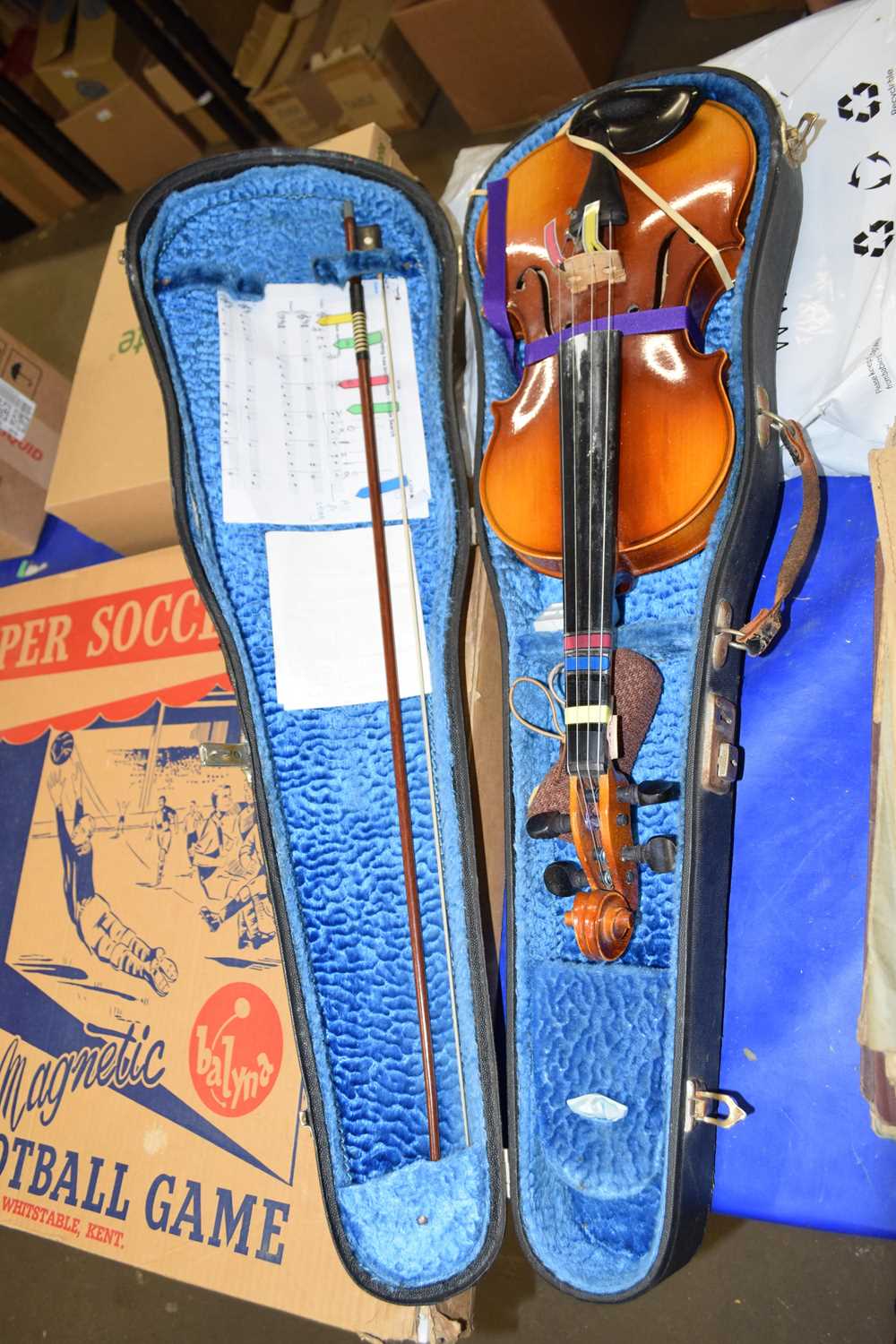 Cased modern violin