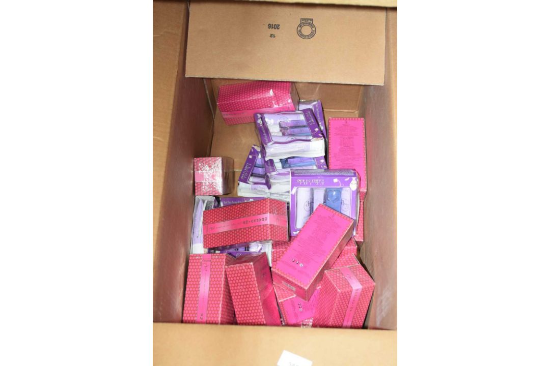 Box containing a quantity of various perfumes etc