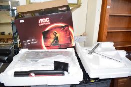 Boxed computer monitor together with four printer/scanners