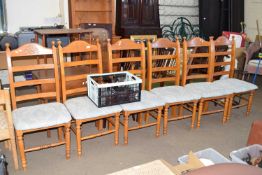 Set of six ladder back upholstered dining chairs