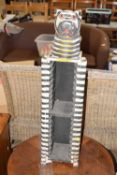 A novelty CD rack formed as a tiger