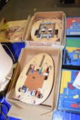 Three boxes of various electronic educational items