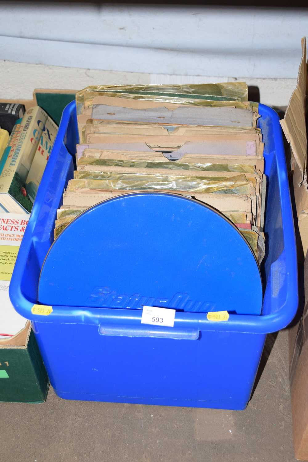 Box containing a quantity of 78 records together with a cased Status Quo album