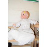 Mid 20th Century ceramic headed doll
