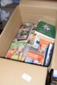 Box containing various Ladybird and other books