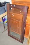 A pair of mahogany glazed cabinet doors