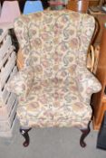 Upholstered easy chair