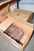 Box containing various photography and other books