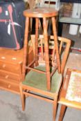 A pine kitchen stool and a single dining chair