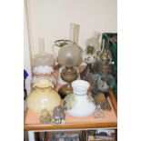 Quantity of various oil lamp shades etc