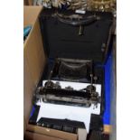 A Corona travel typewriter, in case