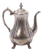 A Victorian silver coffee pot, pear-shaped form with a domed hinged lid and urn finial, having a