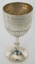 A large silver trophy of goblet form, the upper section engraved "The President's Cup", Fur &