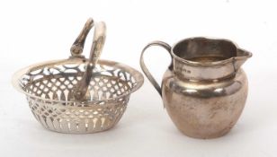Mixed Lot: A small silver cream jug of plain polished form, hallmarked for Birmingham 1911, 6cm tall