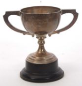 A George V silver twin handled presentation trophy, engraved with 