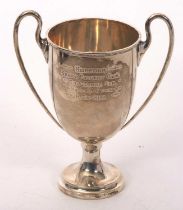 A George V silver twin handled trophy cup, presentation engraved "Norfolk Senior Poultry Challenge
