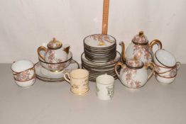 A Japanese eggshell porcelain tea set together with a further Victorian commemorative mug and a 1919