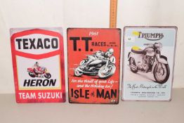 Three reproduction motorcycle related metal signs