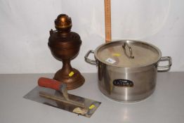 Large aluminium pan, oil lamp and plasterers trowel