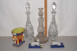 A pair of Staffordshire style recumbent dogs, a novelty tiger dish, glass decanters etc