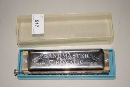 A Bandmaster Deluxe Chromatic Harmonica