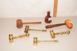 A quantity of assorted metal and brass gavels