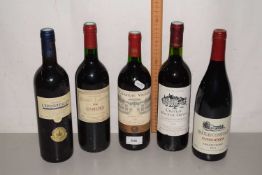 Five bottles of assorted French red wine