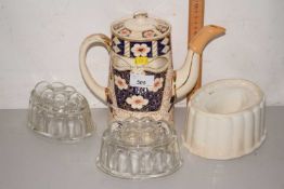Jelly moulds and a coffee pot