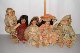 Five collectors dolls
