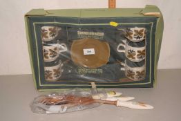 A Staffordshire twelve piece tea/coffee set, boxed together with some serving spoons