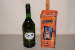 A bottle of Cointreau in presentation tin and a box of Croft Original Sherry