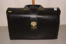 Black leather suitcase