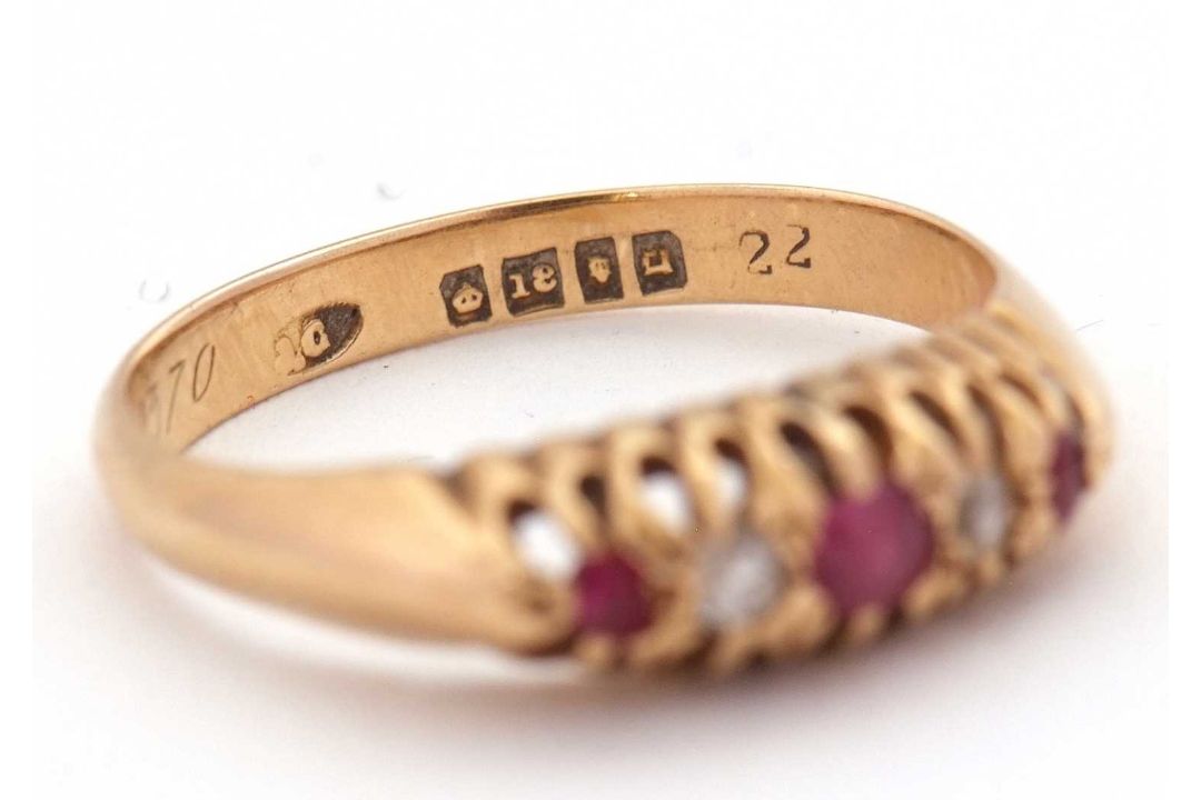 An early 20th century 18ct ruby and diamond ring, the alternating round rubies and old mine cut - Image 5 of 6
