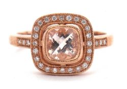 A 9ct rose gold diamond and pink stone ring, the central mixed cut pale pink stone, possibly a