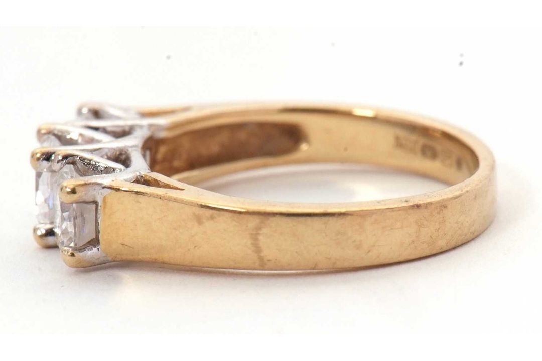 A 9ct CZ ring, the three round CZ's with tapering shoulders and plain band stamped 375 with - Image 5 of 8