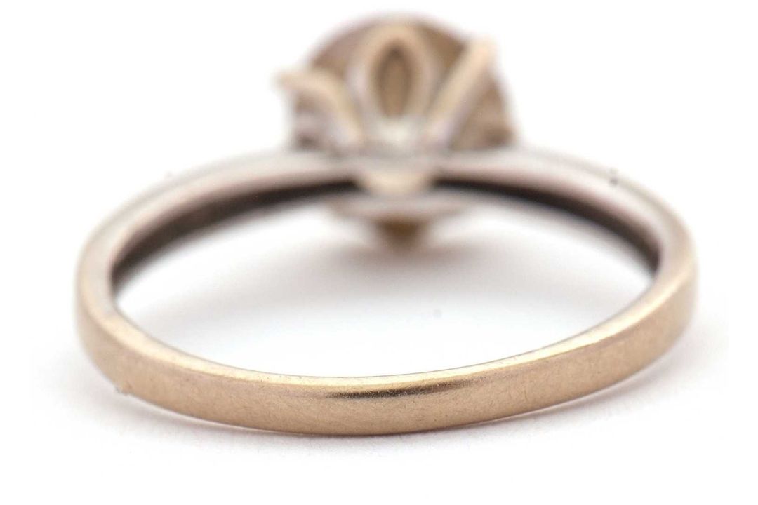 An 18ct champagne diamond solitaire ring, the round brilliant cut diamond, estimated approx. 1. - Image 9 of 9