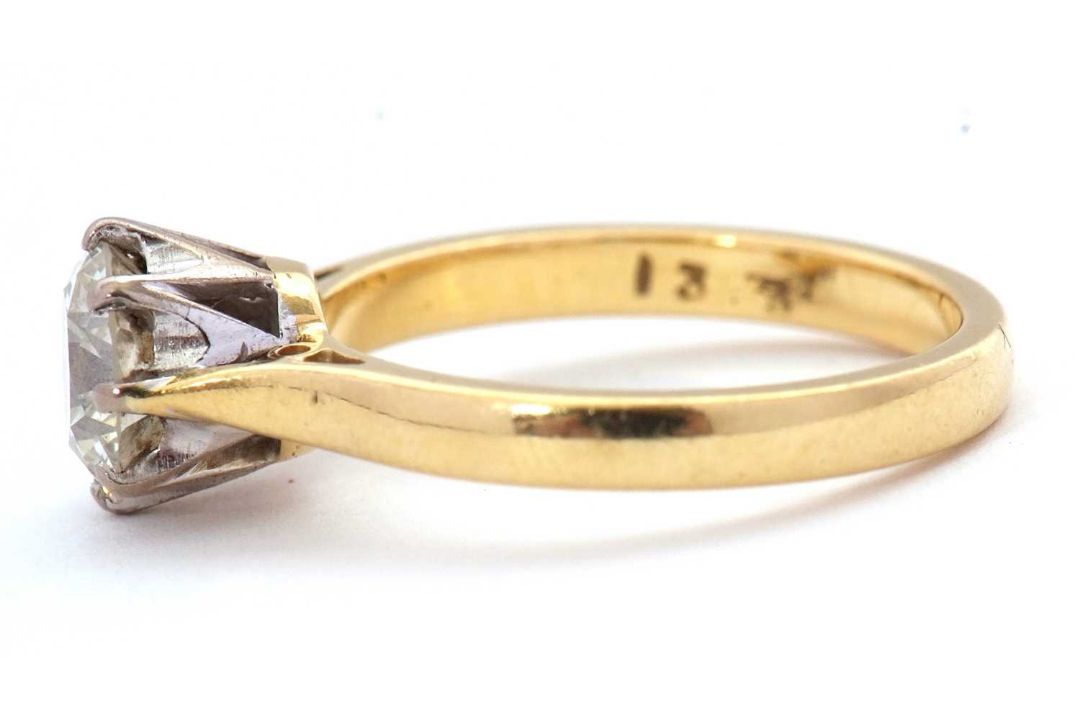 An 18ct diamond solitaire ring, the round brilliant cut dimaond, estimated approx. 1.29cts, colour - Image 3 of 7