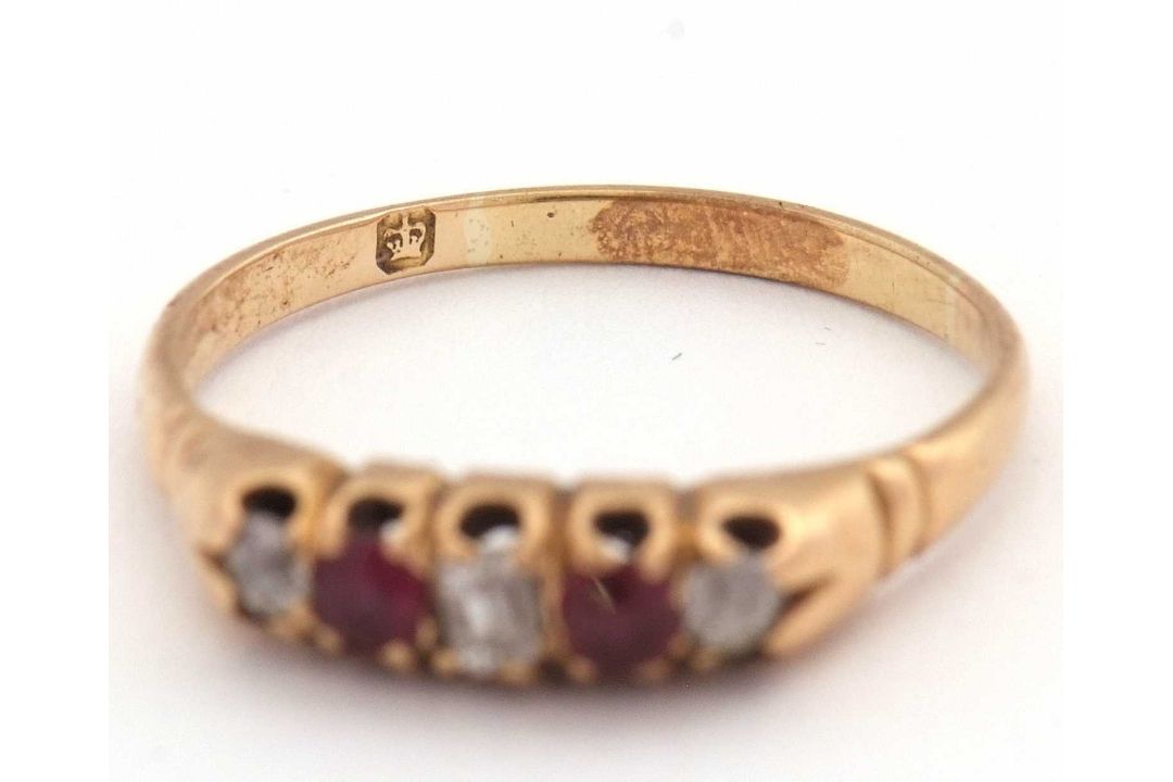 A ruby and diamond ring, set with old mine cut diamonds and mixed cut rubies, with plain band of - Image 6 of 7
