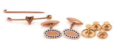 A mixed lot: to include a pair of oval cufflinks with white and blue enamel, stamped 9ct, 4.4g; a