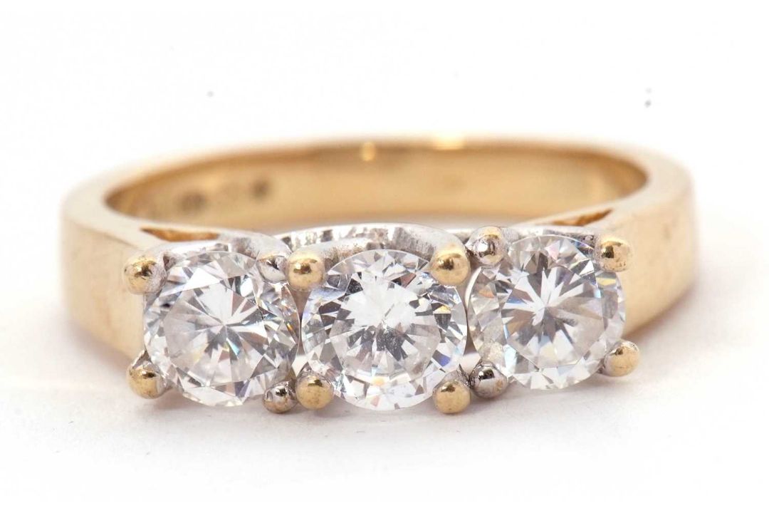 A 9ct CZ ring, the three round CZ's with tapering shoulders and plain band stamped 375 with - Image 6 of 8