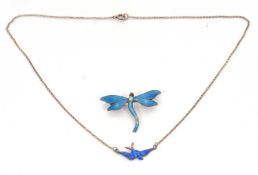 A silver and blue enamel swift pendant necklace, stamped 'sterling silver' to reverse, 25mm wide, on