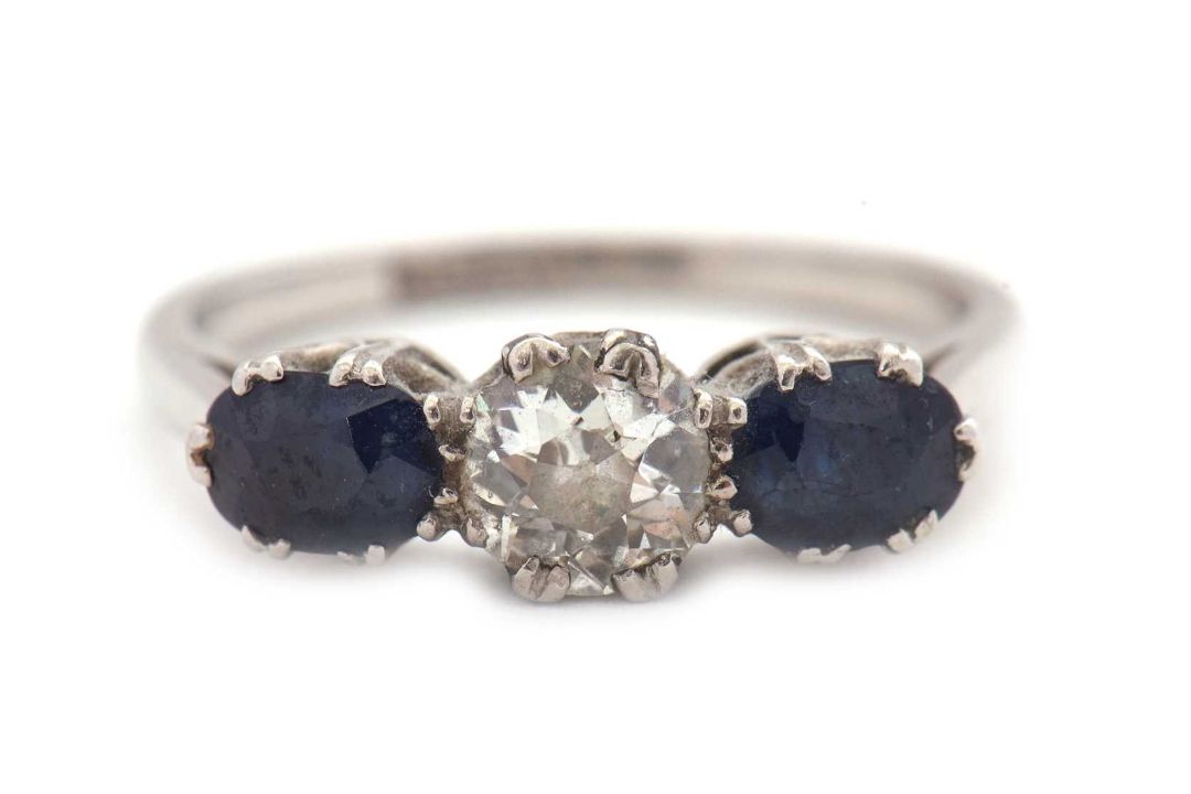 A three stone sapphire and diamond ring, the central old mine cut diamond, estimated approx. 0. - Image 7 of 9