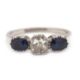A three stone sapphire and diamond ring, the central old mine cut diamond, estimated approx. 0. - Image 7 of 9