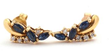 A pair of sapphire and diamond earrings, the curved earrings set with three marquise sapphires and